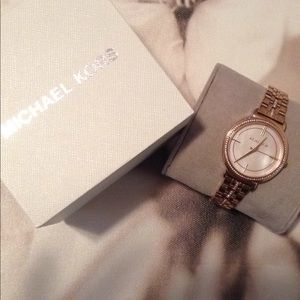 Michael Kors Woman's Watch. Slightly worn.